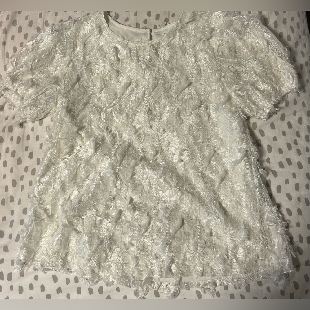 Feathered white formal shirt.
